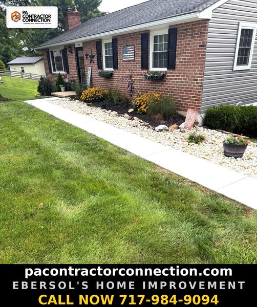 Ebersol's Home Improvement — brick house concrete walkway