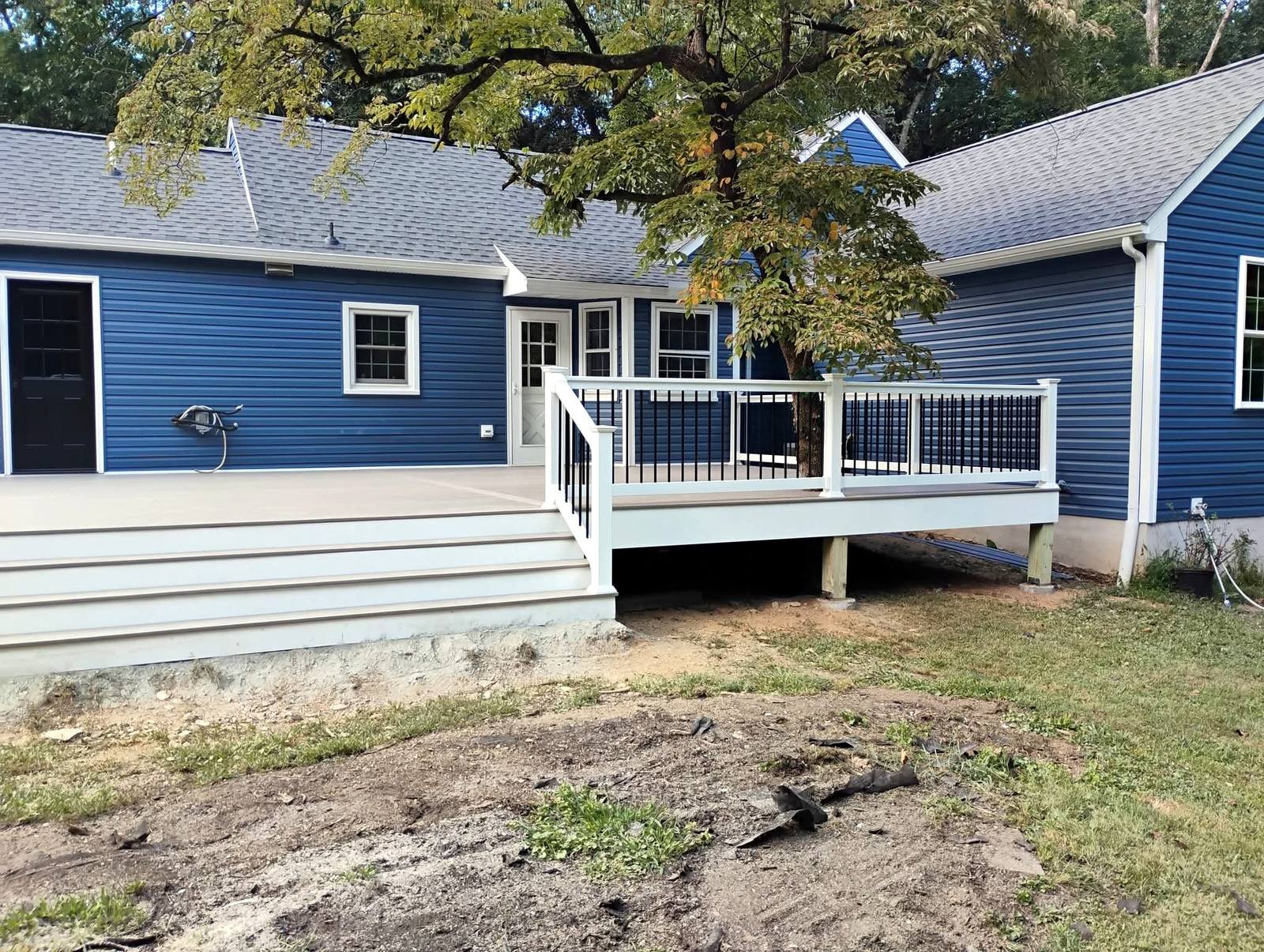 Finished low deck with white and black railings