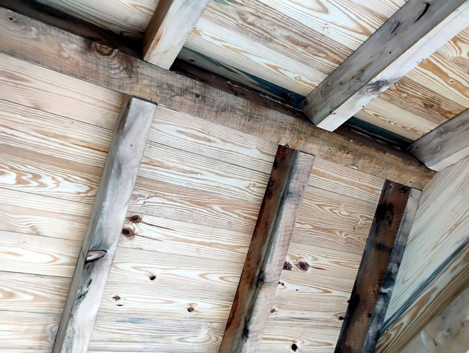 Finished covered porch ceiling and beams
