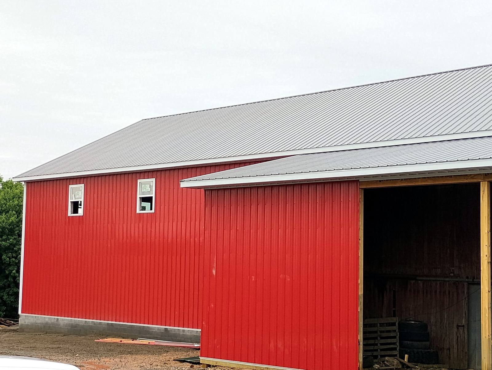 Completed red garage and storage building
