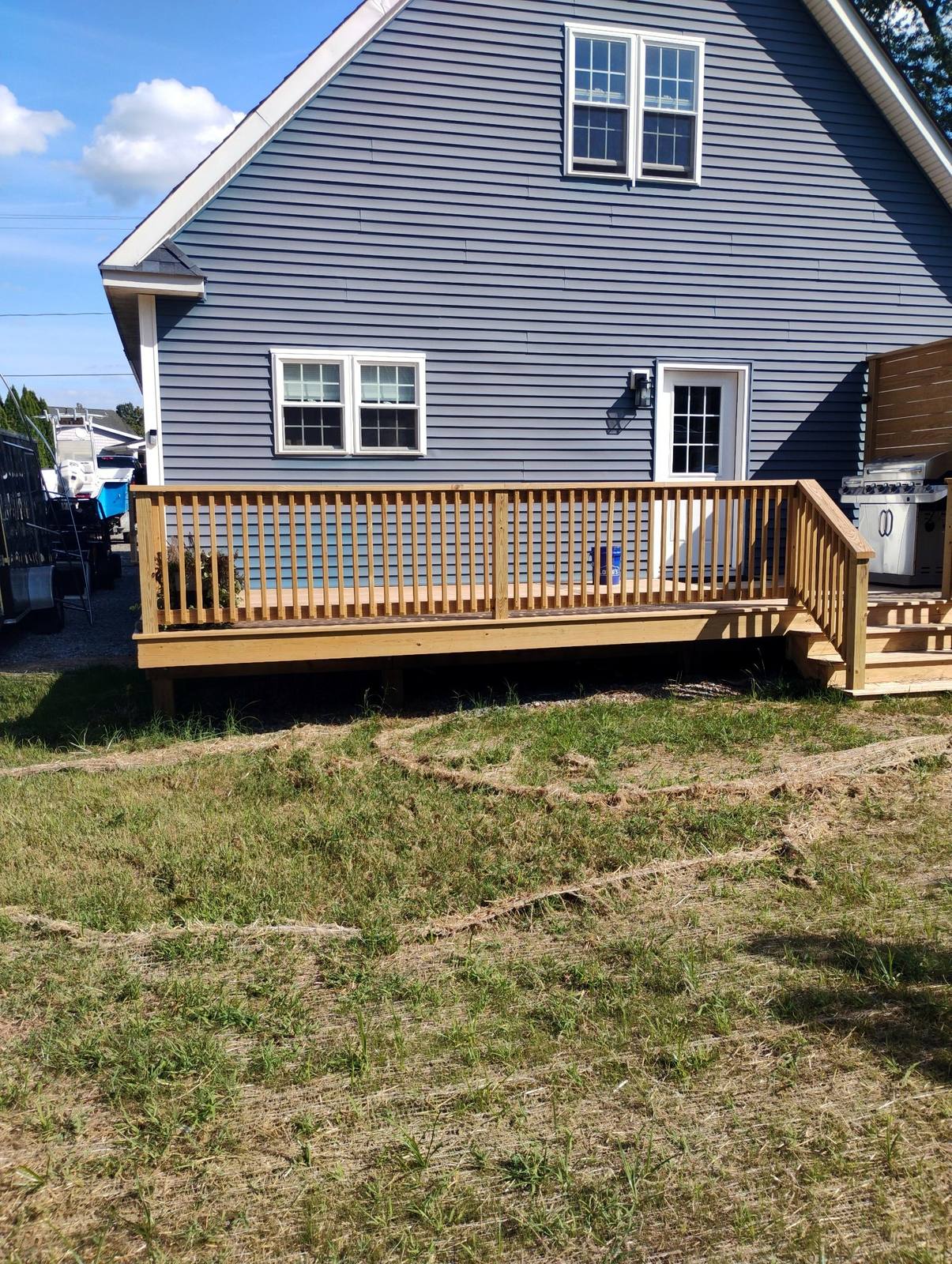 Finished backyard deck and railing project