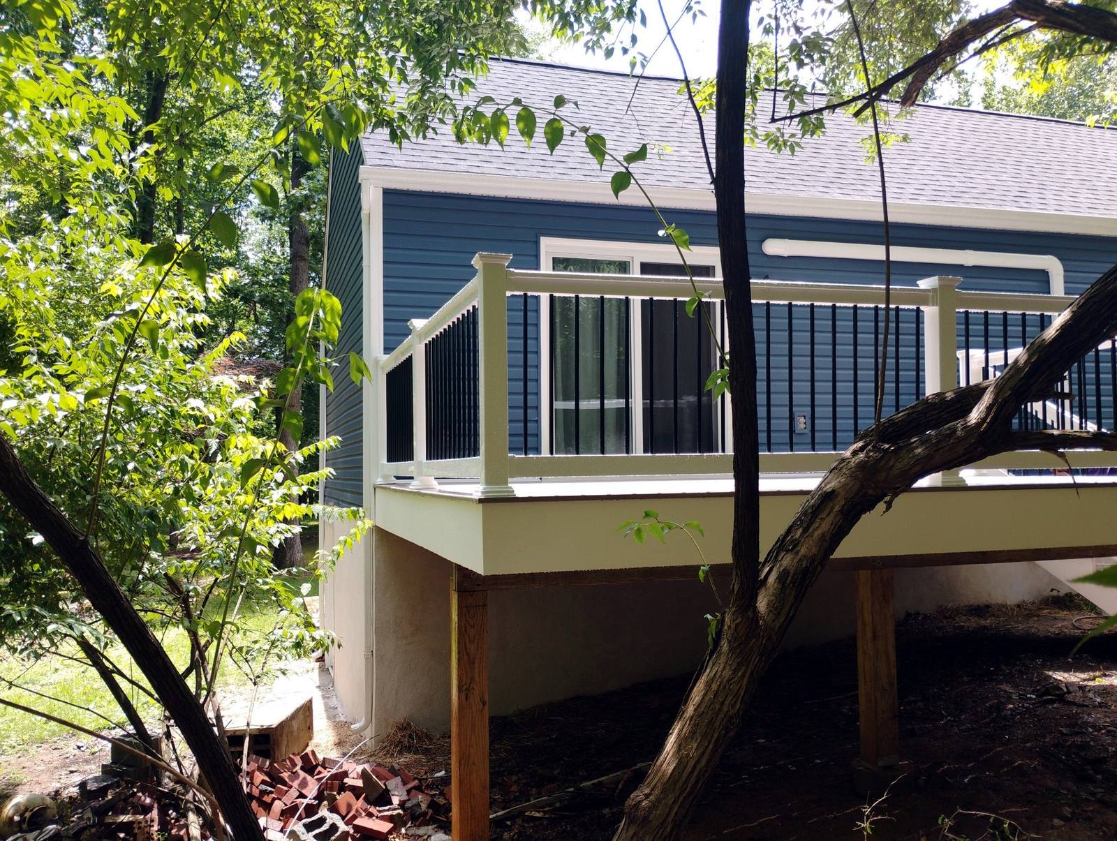 Finished elevated sunroom and deck addition